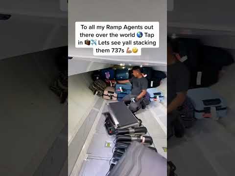 LOADING UP PLANE LUGGAGE